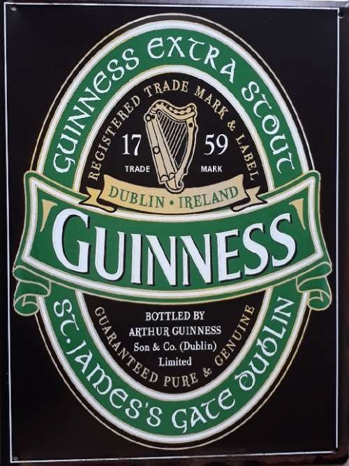 Guinness extra stout metal sign.