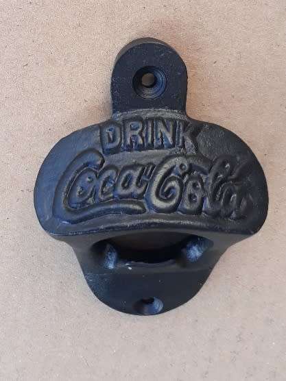Coca-cola Bottle cap opener.