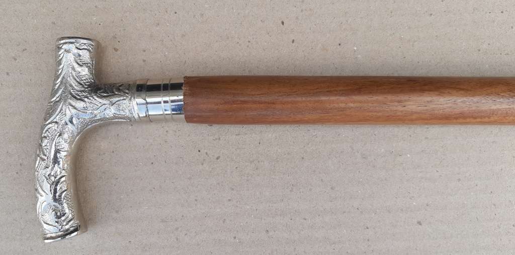 Walking stick. Rosewood with silver handle.