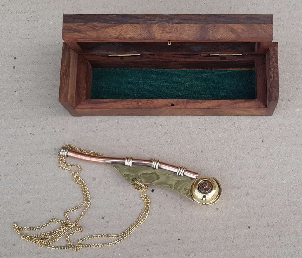 Nautical Boatswain Whistle in a wooden box.
