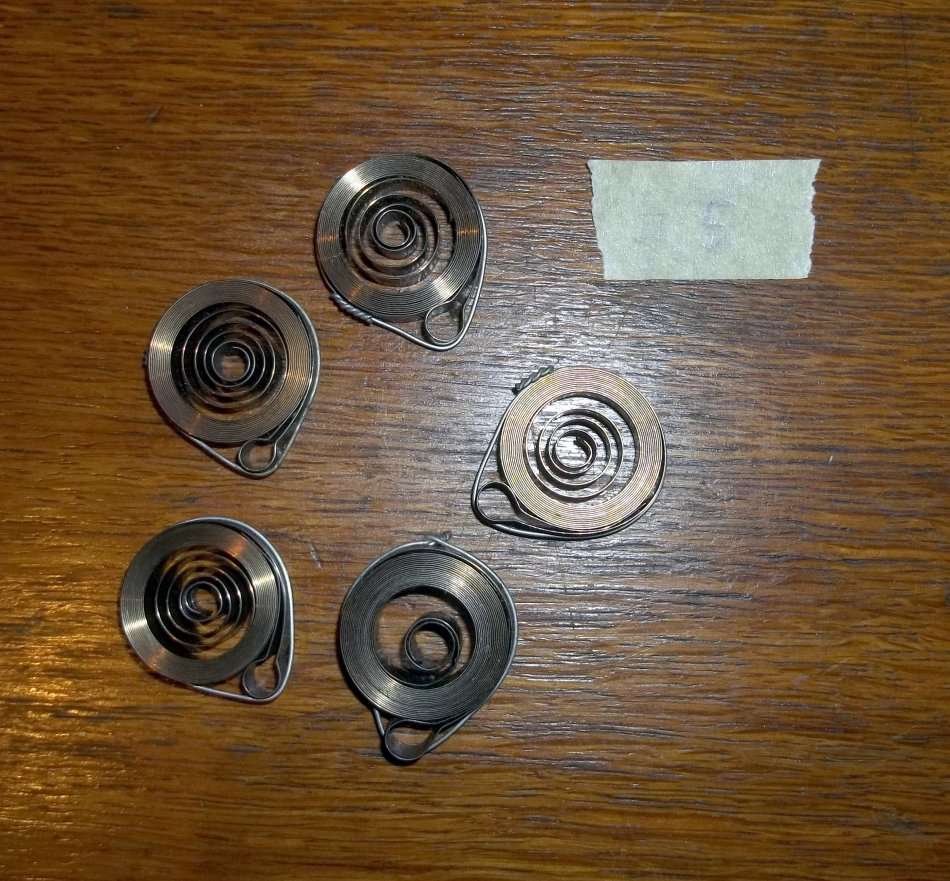 Job lot of 5 loop-end mainsprings. NOS