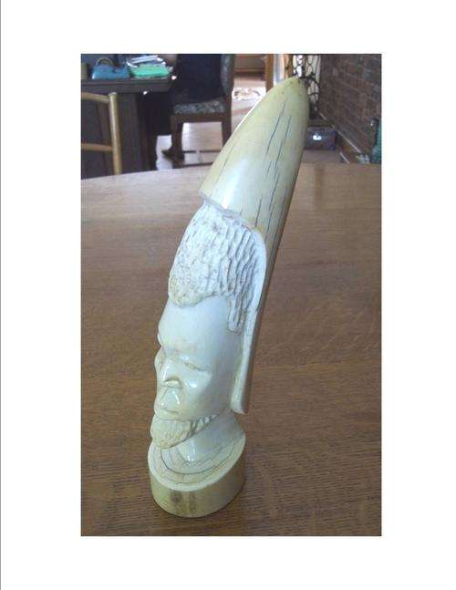 Authentic African elephant carved statue. 26 cm high. Pre 1978 ban. Postage R50.00