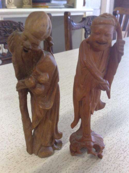 PAIR ORIENTAL CARVED FIGURES