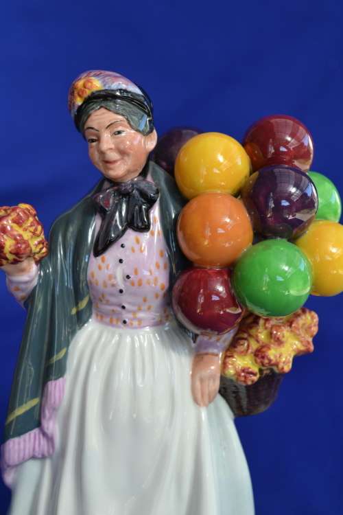 Royal Doulton Figurine "Biddy Penny Farthing" HN1843