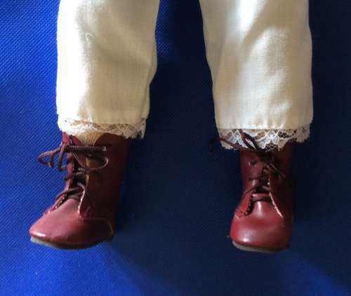 Two Collectable Vintage Porcelain Display Dolls with stands