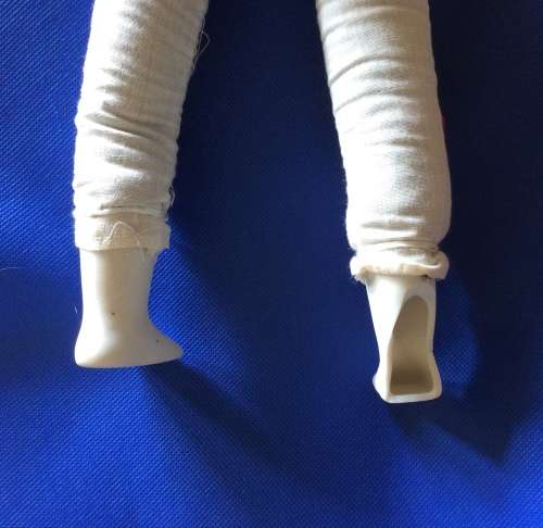 Two Collectable Vintage Porcelain Display Dolls with stands