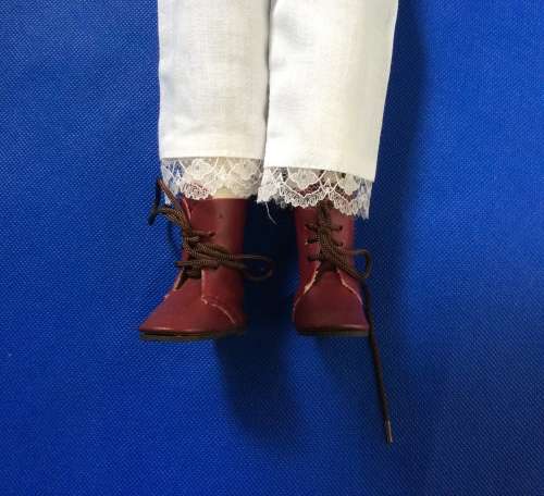 Two Collectable Vintage Porcelain Display Dolls with stands