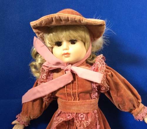 Two Collectable Vintage Porcelain Display Dolls with stands