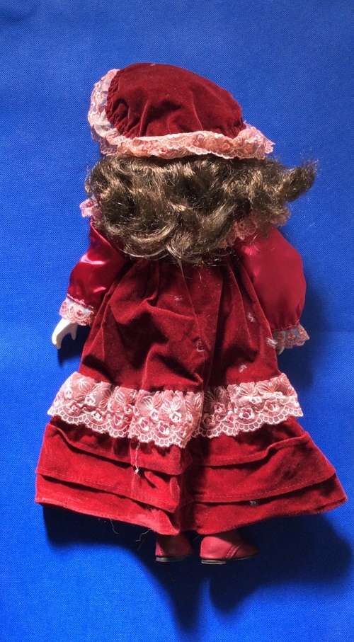 Two Collectable Vintage Porcelain Display Dolls with stands