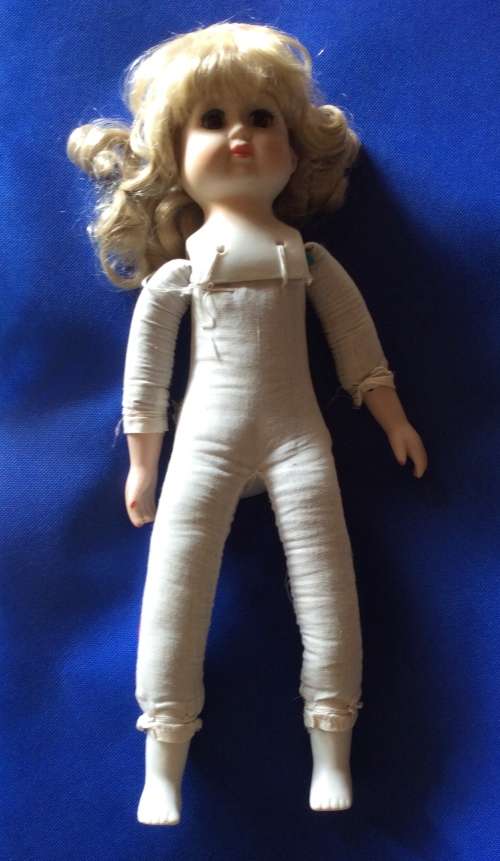 Two Collectable Vintage Porcelain Display Dolls with stands