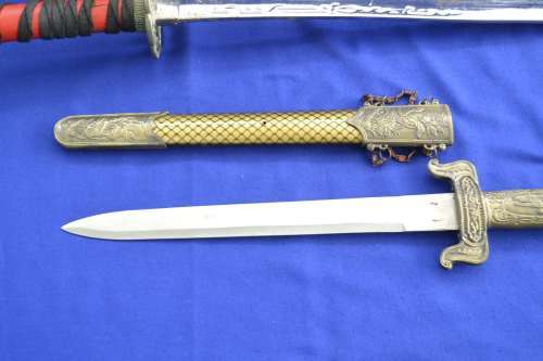 Two Old Decorative Swords
