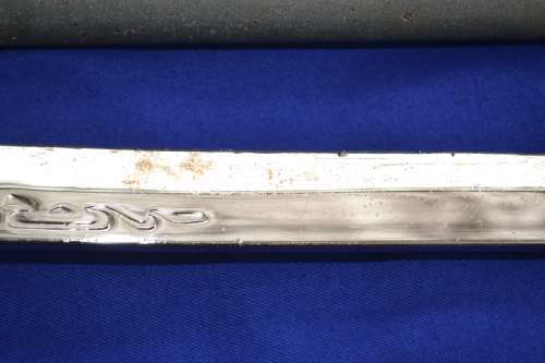 Two Old Decorative Swords