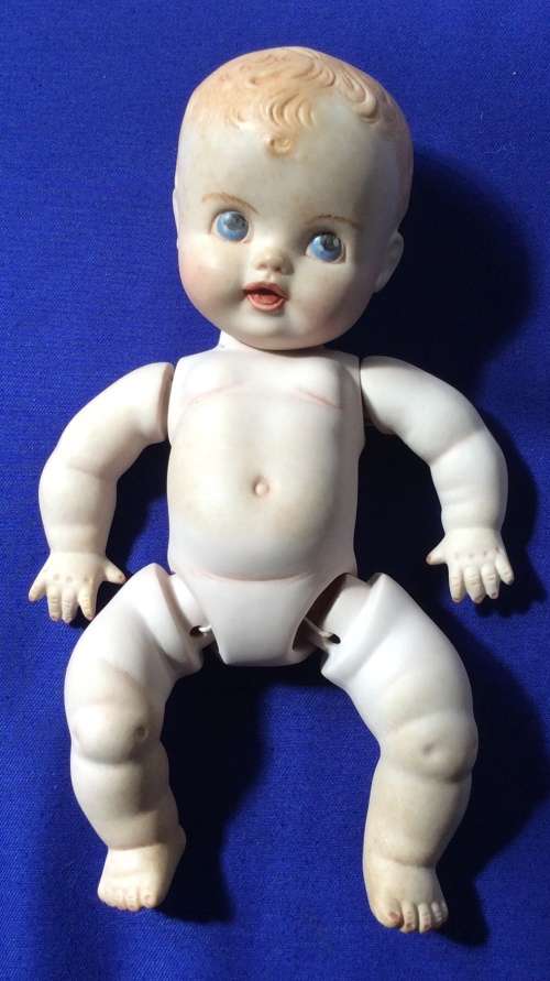 Vintage Bisque Porcelain  String Jointed Baby Dolls