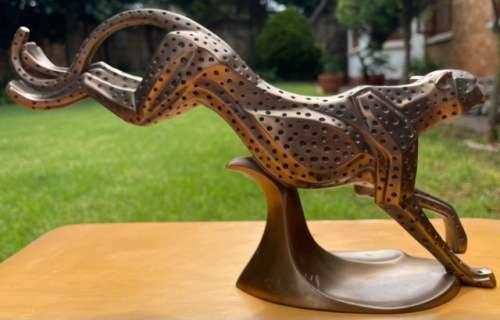 DESK TOP SIZE BRONZE SCULPTURE, RUNNING CHEETAH BY UNKNOWN ARTIST