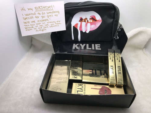 Kylie Jenner golden gift box