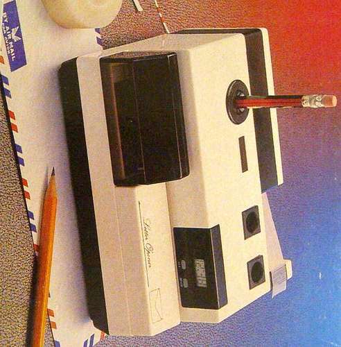 BATTERY OPERATED 5 IN 1 LETTER OPENER-PENCIL SHARPENER-CLOCK-ADHESIVE TAPE DISPENSER-PEN HOLDER