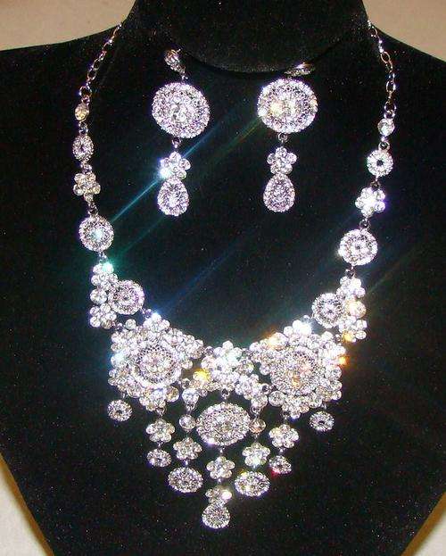 DESIGNER SILVER NECKLACE WITH SIMULATED DIAMONDS AND MATCHING EARRINGS