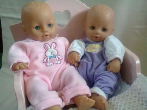 Doll cot plus 2 baby dolls