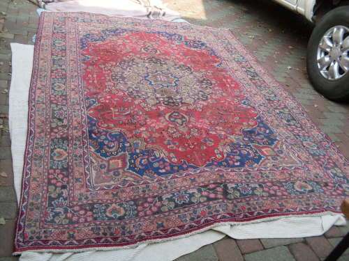 FOR CONSIDERATION A LARGE PERSIAN HAND KNOTTED MASHAD CARPET, CENTRAL MEDALLIONS FLORAL GEOMETRIC
