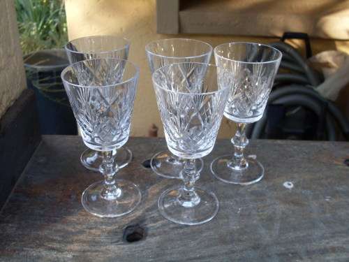 BRILLIANT ITEM. A SET OF FIVE CUT CRYSTAL WINE GLASSES WITH DIAMOND & BURST