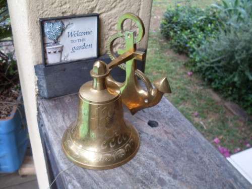 NAUTICAL (ANCHOR) THEMED LARGE??  BRASS BELL SOME CHASED DESIGN, GREAT FOR PUB, MAN CAVE ETC.
