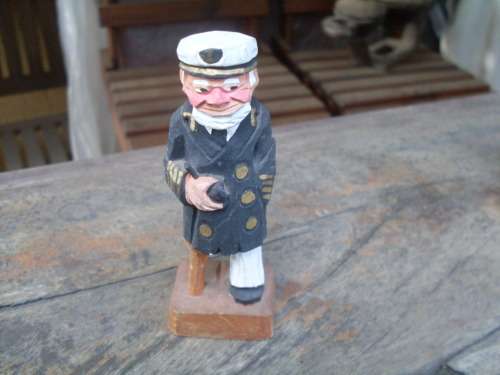 CARVED PAINTED WOODEN ORNAMENT OF A SEA CAPTAIN / FISHERMAN WITH PEG LEG