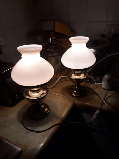 A VINTAGE PAIR OF ITALIAN? STYLED BRASS PLATE TABLE LAMPS WITH PALE PINK STUDENT GLASS LAMPSHADES