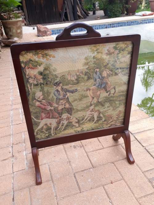A BEAUTIFUL WOOD WITH TAPESTRY LIKE OLD HUNTING SCENE FIRE PLACE SCREEN. GORGEOUS!