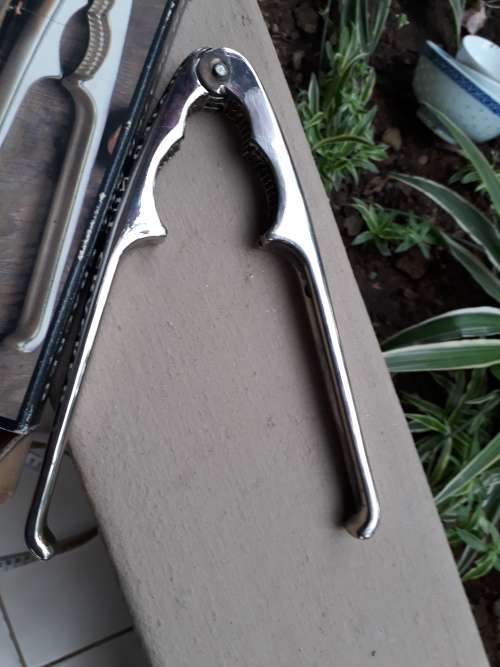 IN A NUTSHELL!! HEREWITH A BOXED VINTAGE SILVER PLATED NUT CRACKER