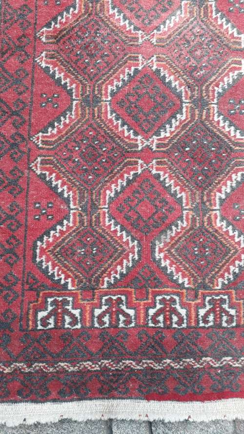 FOR CONSIDERATION A SMALL HAND KNOTTED PERSIAN/ORIENTAL BALOUCH RUG GEOMETRIC