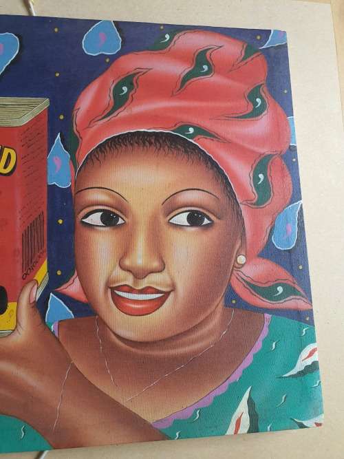 STUNNING VINTAGE SIGNED BLANCHARD `99 NAIVE AFRICAN WOMAN WITH BULL BRAND TIN CANVAS PAINTING