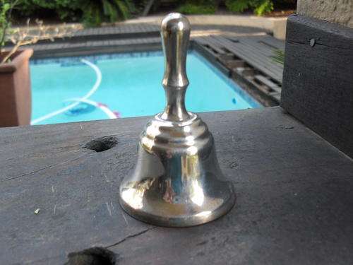 MARKED H SILVER PLATED BELL WITH A GREAT RING