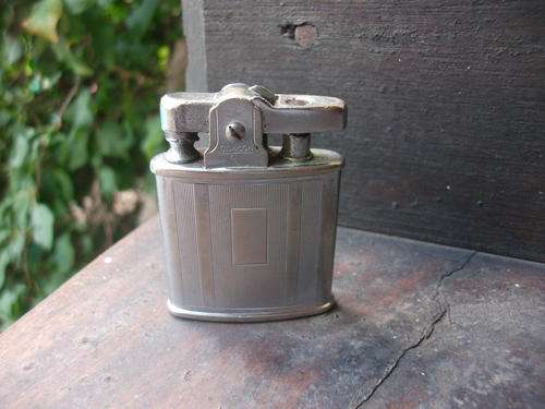 LIGHT UP YOUR LIFE WITH A VINTAGE RONSON (ENGLAND) SILVER METAL LIGHTER