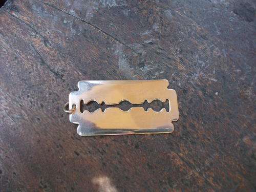 RATHER INTERESTING RAZOR BLADE PENDANT (NO CHAIN) NOT MARKED BUT BELIEVE IT TO BE SILVER