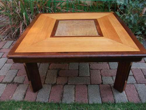 YELLOWWOOD & STINKWOOD?????? SQUARE COFFEE TABLE WITH CENTRE RATTAN & GLASS DETAIL EXCEPTIONAL