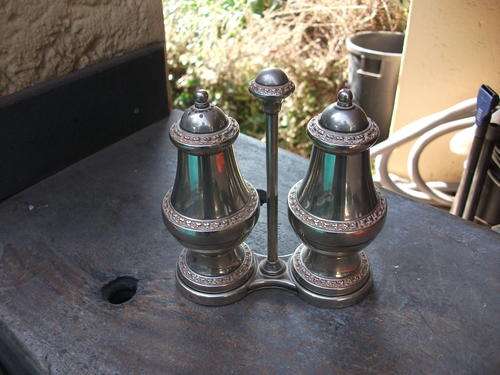 MADE IN ENGLAND SILVER PLATED SALT & PEPPER SET ON A STAND. NICE!