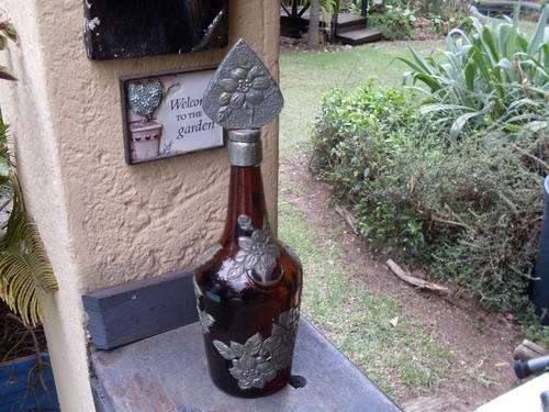 REDUCED!!  STUNNING AMBER DECANATER WITH PEWTER OVERLAY IN FLORAL DESIGN, WOW!!