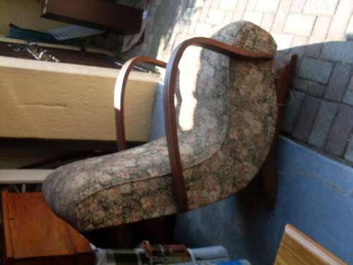 WOW, AN OLDIE BUT GOODIE 1940'S???? BANANA ROCKING CHAIR. UPHOLSTERED & ROCKS!