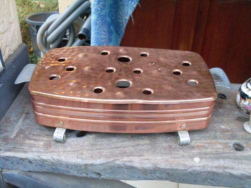 THIS A LOOKER. STUNNING COPPER WARMING PIECE WITH CONTRASTING FIN HANDLES.