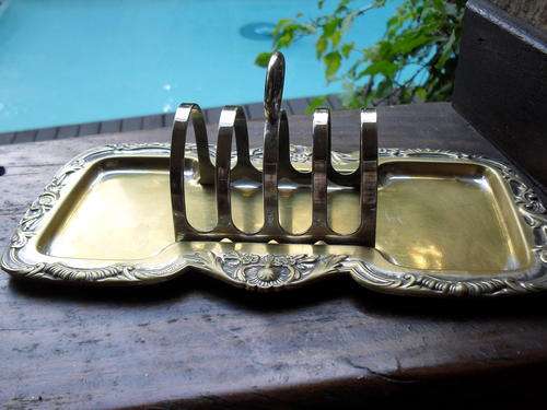 PARTICULARLY NICE TOAST RACK+ (WAS) SILVER PLATE ON BRASS, STILL A NICE PIECE. GORGEOUS DESIGN