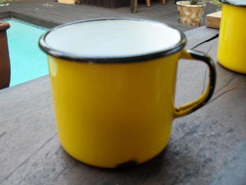 MADE IN POLAND, BRIGHT YELLOW ENAMEL CUP....DO LOOK