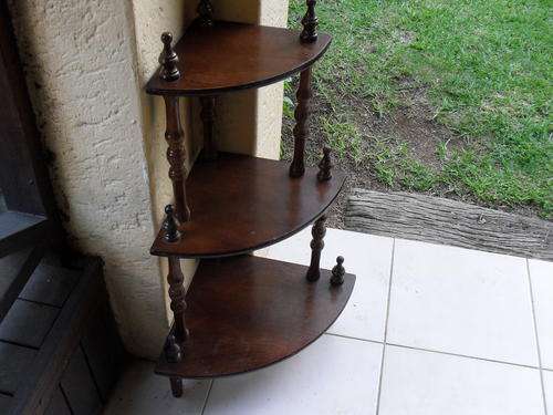 A SMALL THREE TIER WHAT NOT....IT IS VERY NICE AND WORTH A PEEK