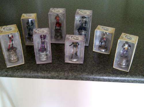 8 dc figurines in boxes  one bid takes all