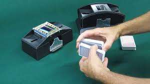 AUTOMATIC CARD SHUFFLER