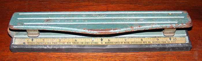 Vintage adjustable hole paper punch
