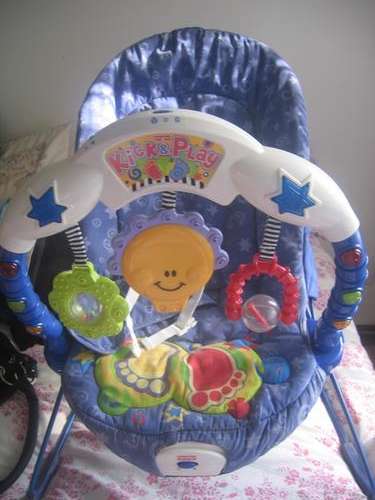 Fisher Price Kick and Play musical vibrating bouncer chair