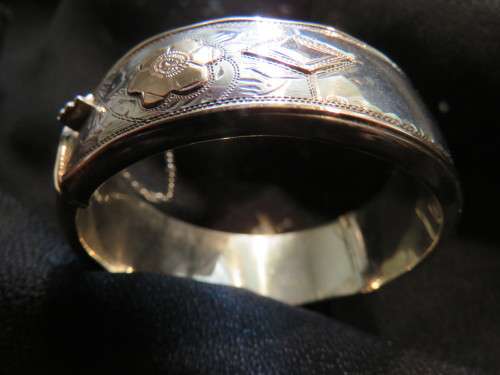 VINTAGE SILVER WITH GOLD OVERLAY WAX FILLED BANGLE - CIRCA 1940