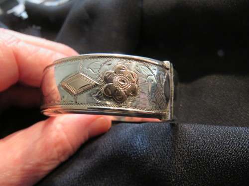 VINTAGE SILVER WITH GOLD OVERLAY WAX FILLED BANGLE - CIRCA 1940
