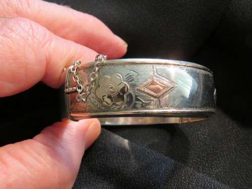 VINTAGE SILVER WITH GOLD OVERLAY WAX FILLED BANGLE - CIRCA 1940