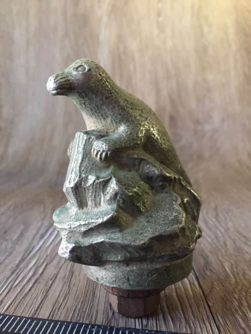 Vintage Car Hood Ornament of Seal on Rock